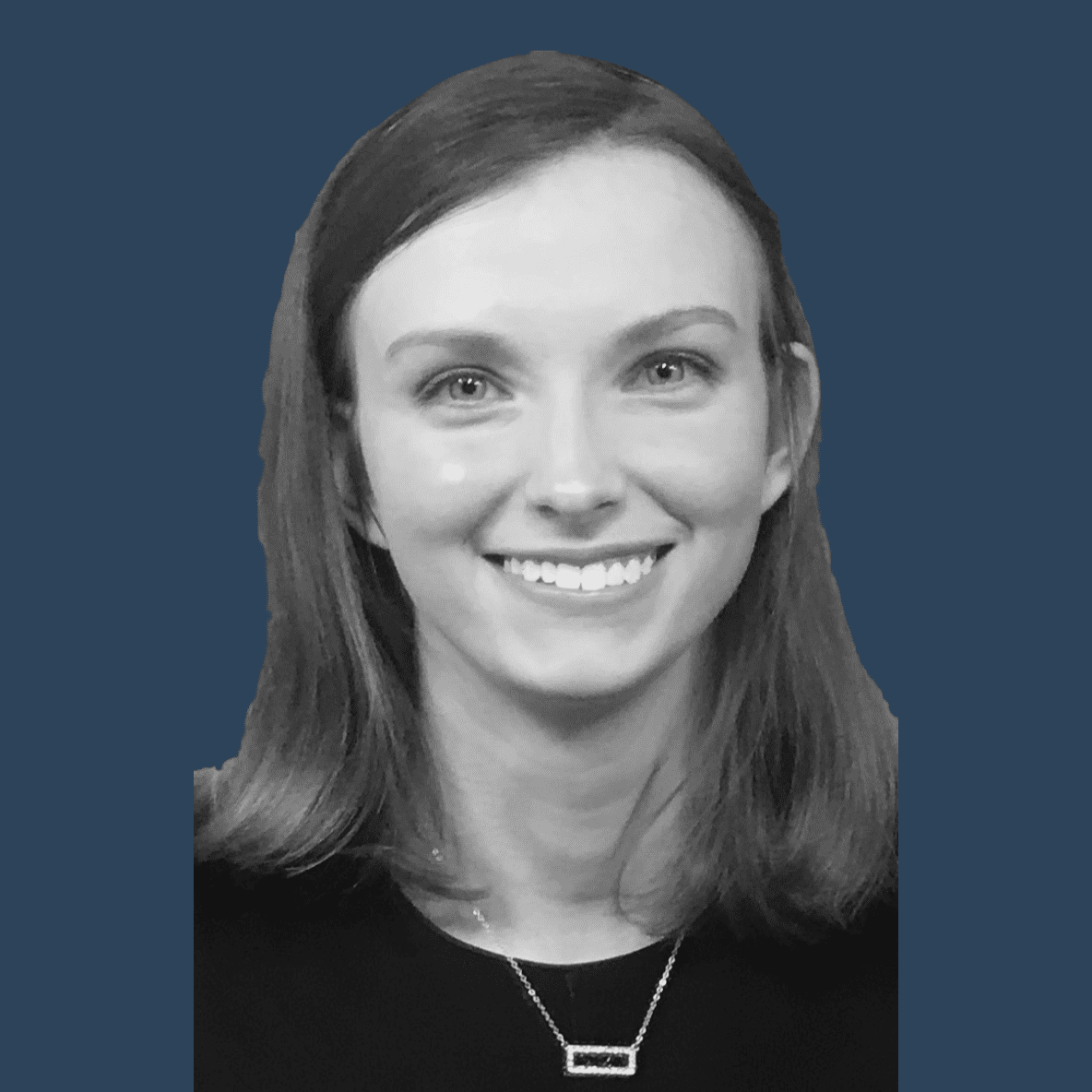 black and white headshot on dark blue background